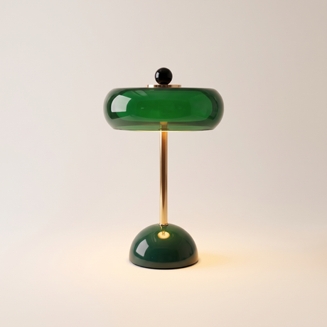Verdi cordless table lamp lit warm on a soft off-white studio background