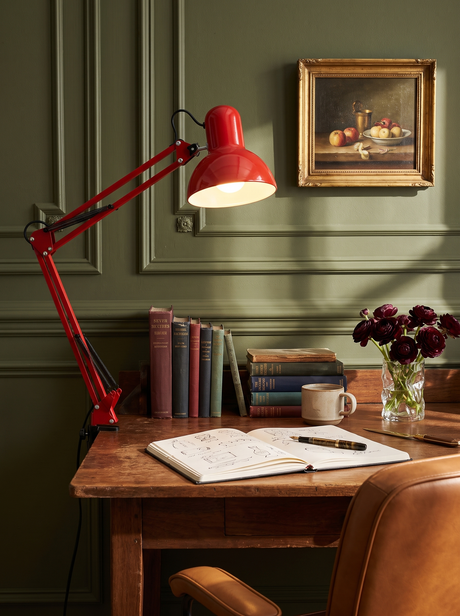 Lifestyle: Otis architect clamp lamp in red on an antique writing desk against green panelling