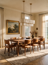 Lifestyle: Marelle oval shell chandelier over a long dining table showing its size