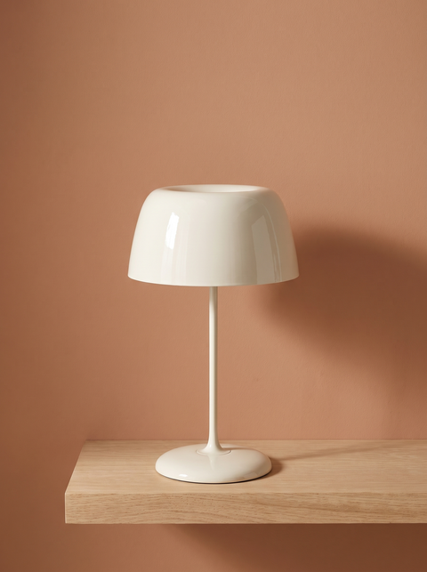 Bittel retro mushroom table lamp in white on a clay terracotta backdrop