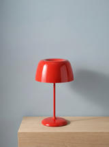Bittel retro mushroom table lamp in red on a dusty blue backdrop