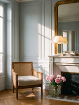 Lifestyle: white Bittel table lamp on a marble mantel in a pale blue Parisian salon, shown to scale