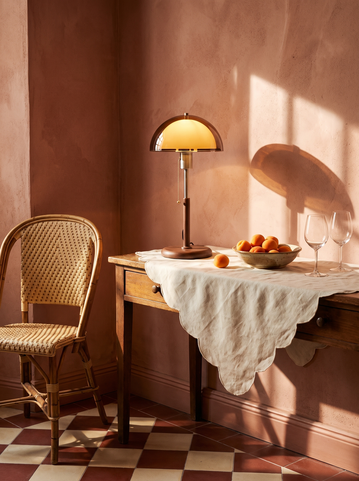 Lifestyle: Cosima lamp glowing on a console in a pink plaster dining room