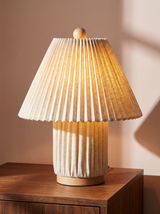 Lifestyle: Esme table lamp detail, pleated linen and turned-wood base