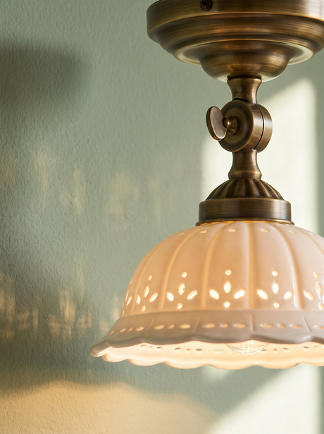 Lifestyle: Colette ceiling light detail, pierced porcelain shade and brass fitting