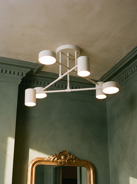 Lys sputnik semi-flush ceiling light in white in a sage plaster corner