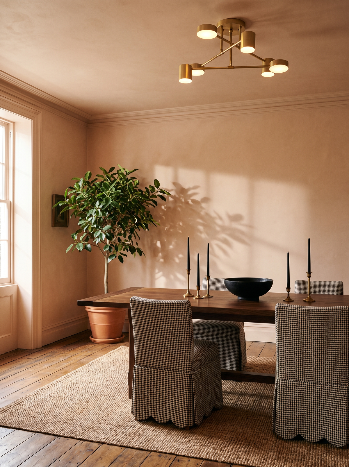 Lifestyle: Lys sputnik ceiling light over a walnut table in a peach-blush dining room