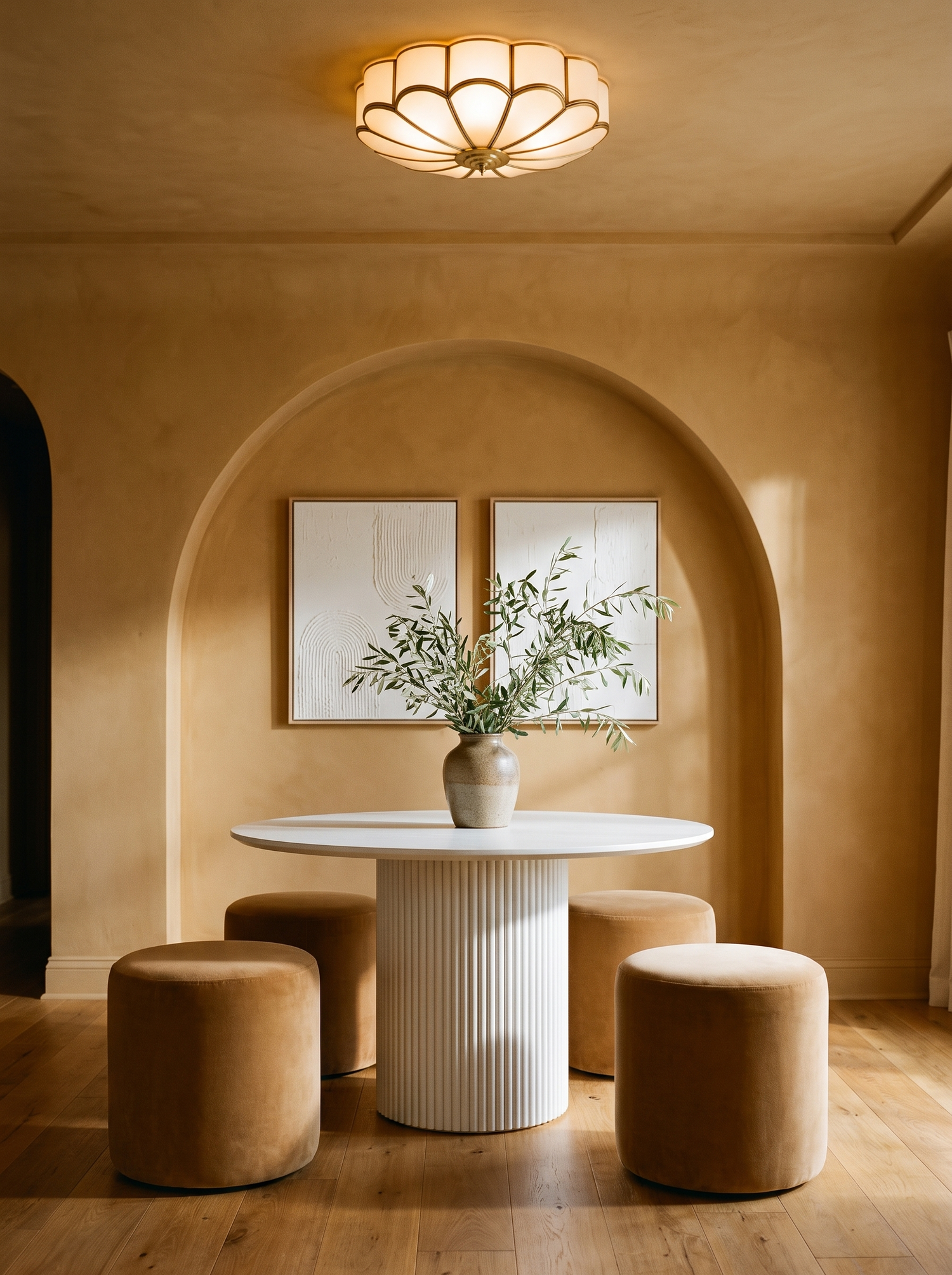 Lifestyle: Marguerite flower ceiling light above a round table in an ochre dining room, showing its size