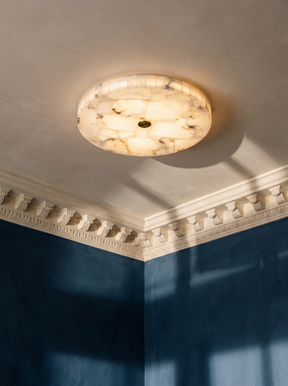 Opal mosaic alabaster flush mount ceiling light in an ink-blue plaster-moulded corner