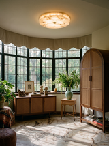 Lifestyle: Opal alabaster ceiling light in a leaded-glass conservatory living room, showing its size