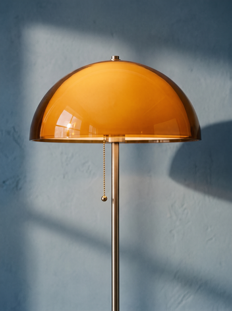 Lifestyle: close-up of Briar's amber dome and pull chain, lit