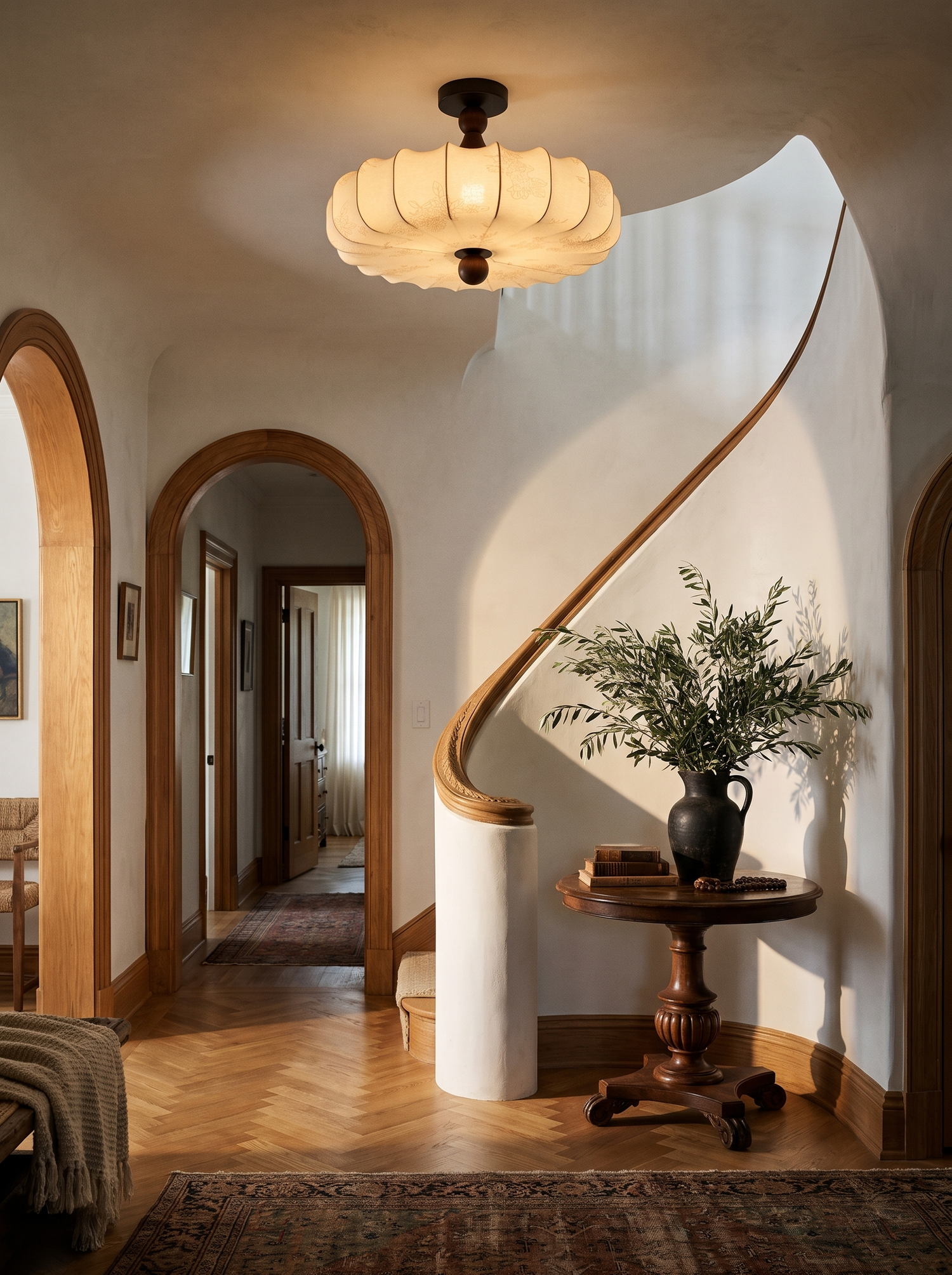Lifestyle: Posy scalloped ceiling light in a curved plaster stair hall