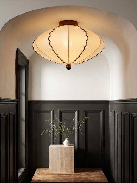 Lifestyle: Bonnie scalloped ceiling light in a charcoal-panelled entry nook