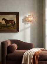 Lifestyle: Sylva sconce beside an oil painting