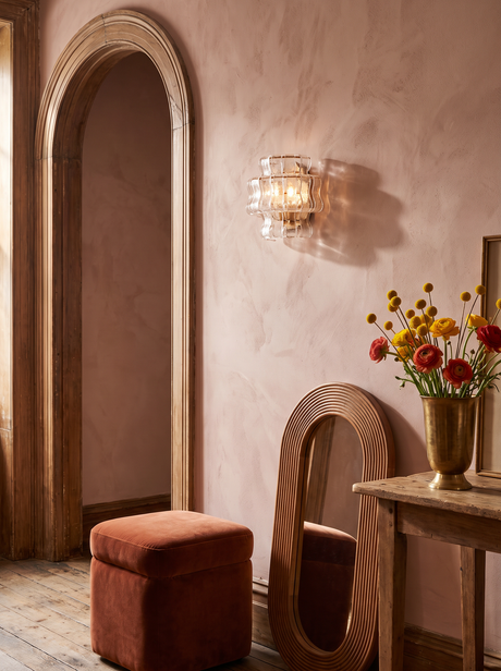 Lifestyle: Sylva sconce beside an arched doorway