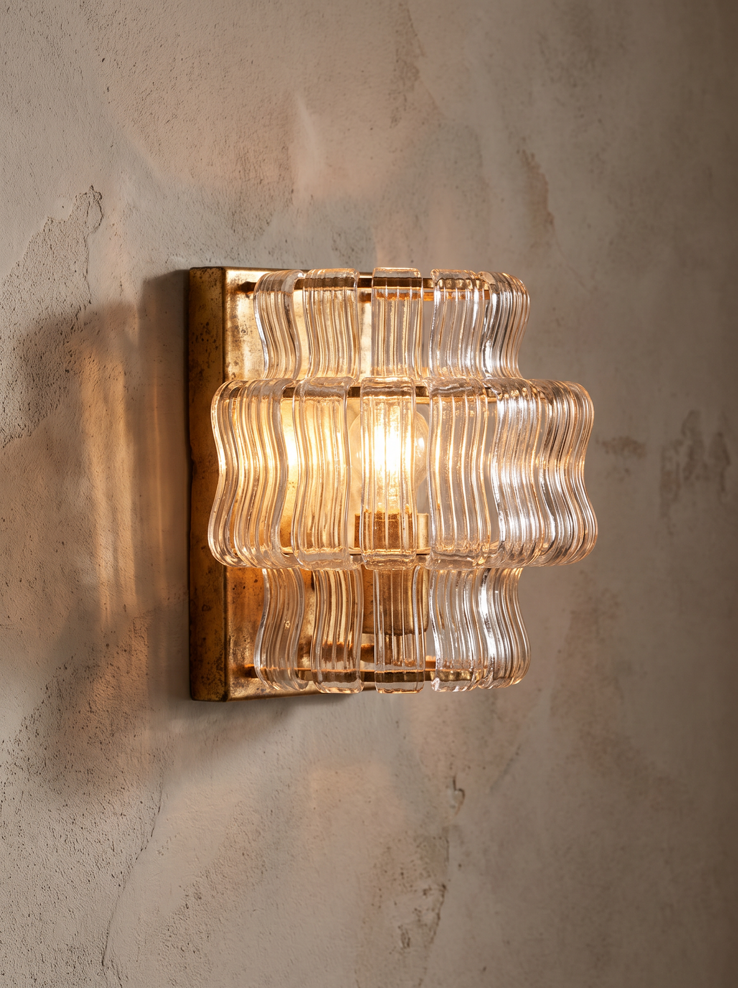 Detail: fluted glass and tiered banding of the Sylva sconce