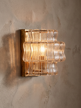 Detail: fluted glass and tiered banding of the Sylva sconce