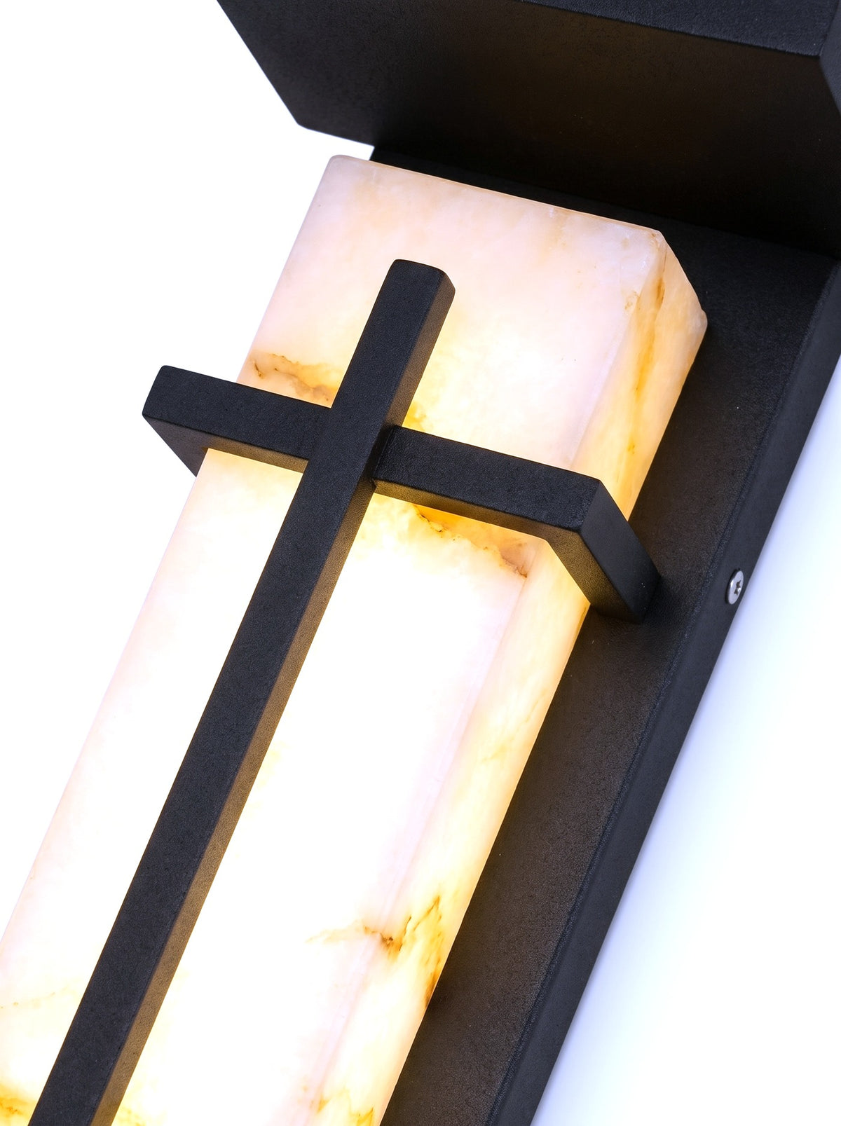 Close-up of the marbled-alabaster diffuser panel and black cross-bar