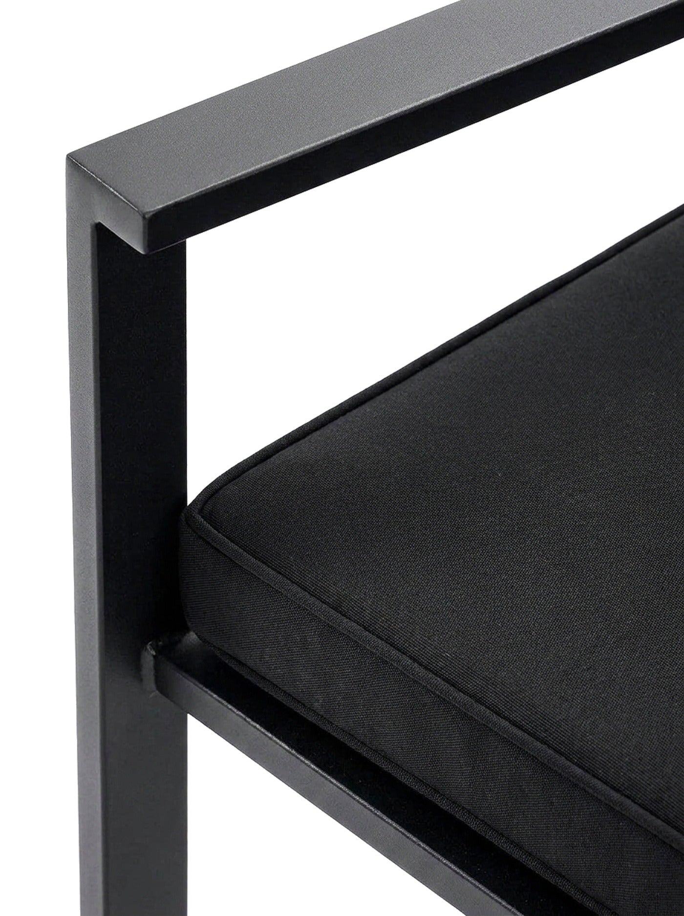 Nero black metal arm and cushion detail, close-up on white