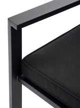 Nero black metal arm and cushion detail, close-up on white