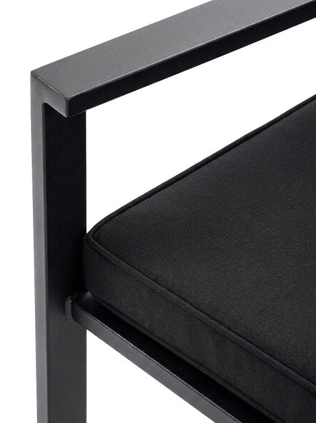 Nero black metal arm and cushion detail, close-up on white