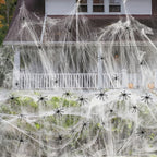 Dense cobweb blanketing a porch at night