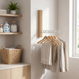 Nils hanger rails mounted in white tiled laundry