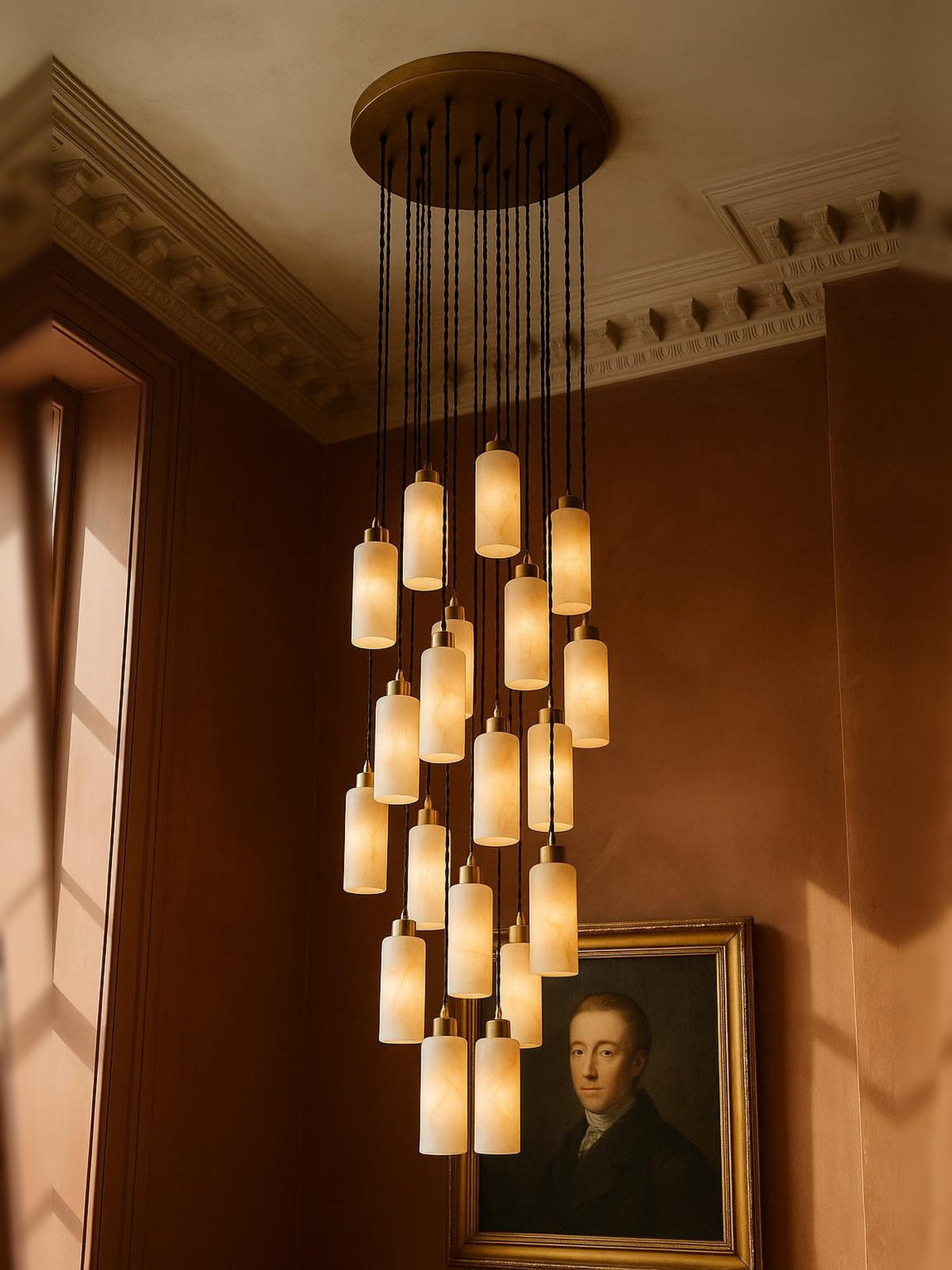 Sola twenty-one-pendant alabaster cluster pendant in brass in a sienna plaster corner