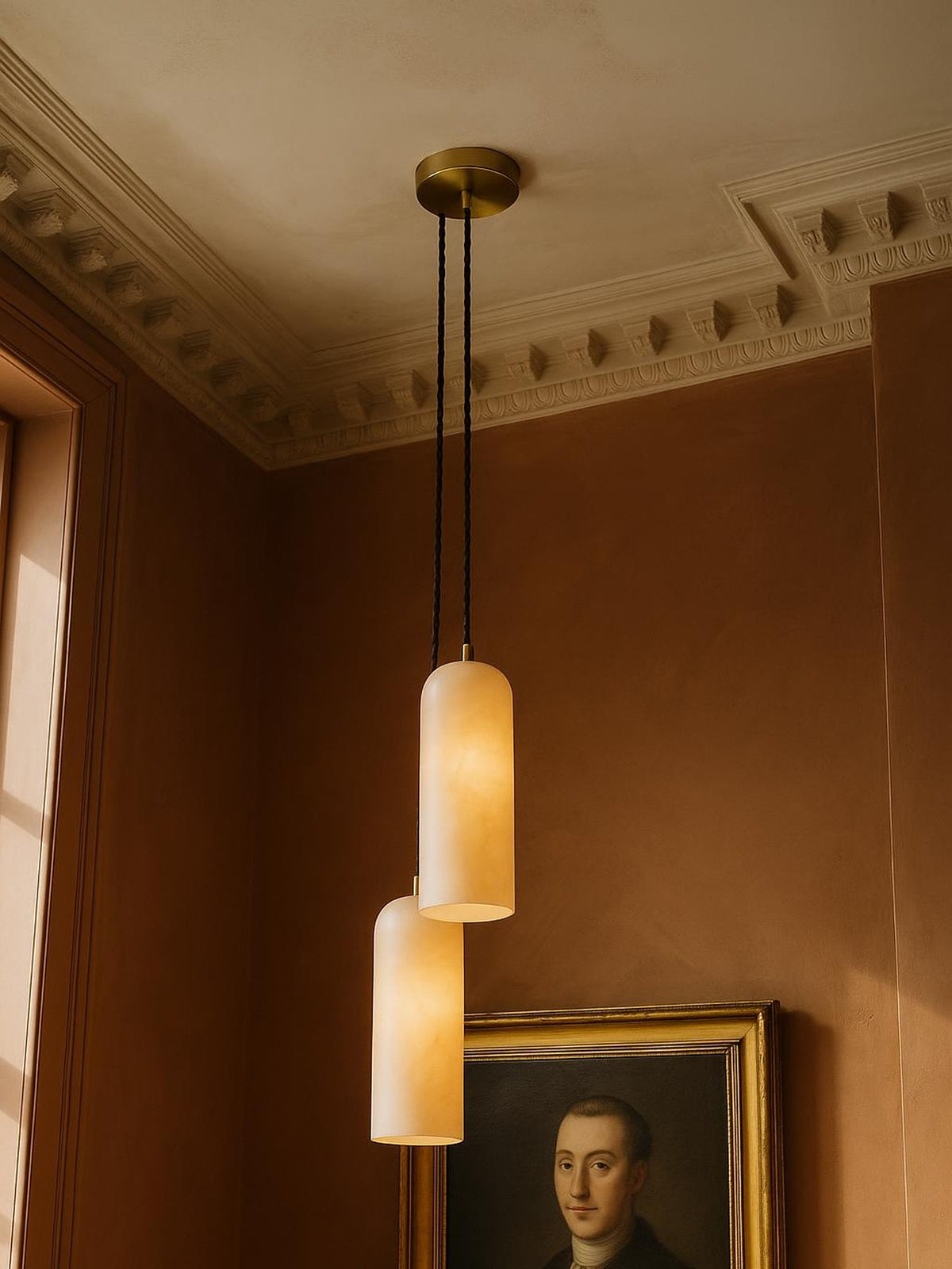 Sola two-pendant alabaster cluster pendant in brass in a sienna plaster corner