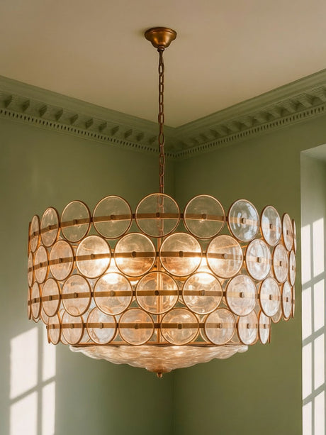 Soleil 37.4-inch clear glass disc chandelier hanging in a plaster-moulded corner