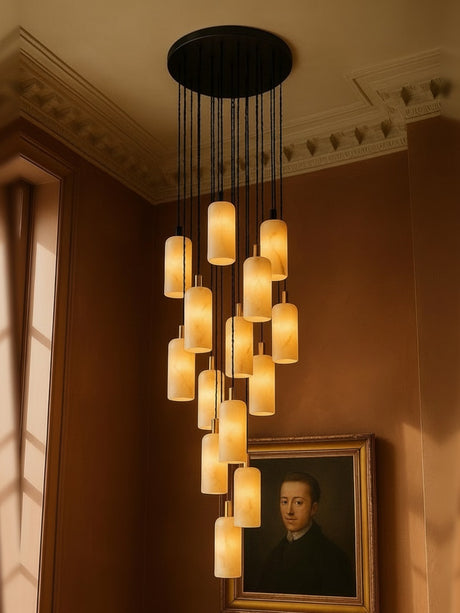 Sola fifteen-pendant alabaster cluster pendant in black in a sienna plaster corner