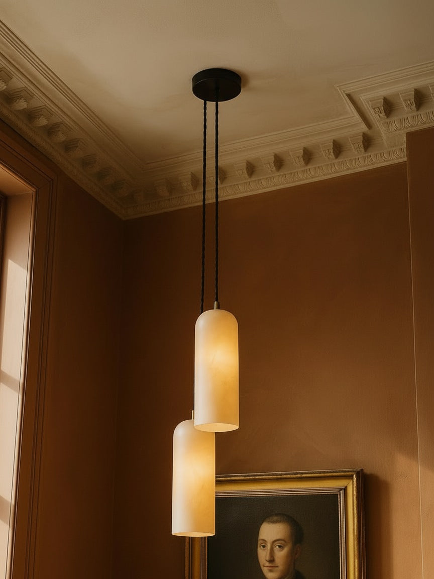 Sola two-pendant alabaster cluster pendant in black in a sienna plaster corner