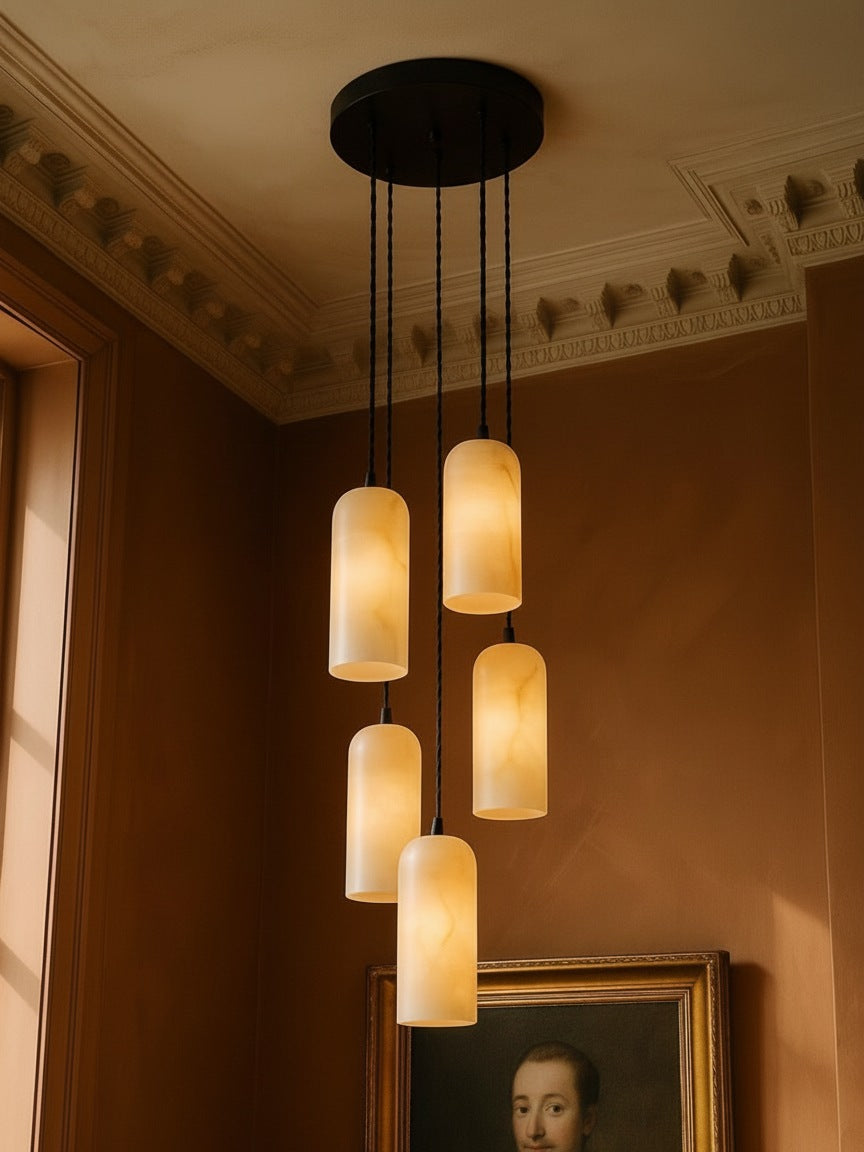Sola five-pendant alabaster cluster pendant in black in a sienna plaster corner