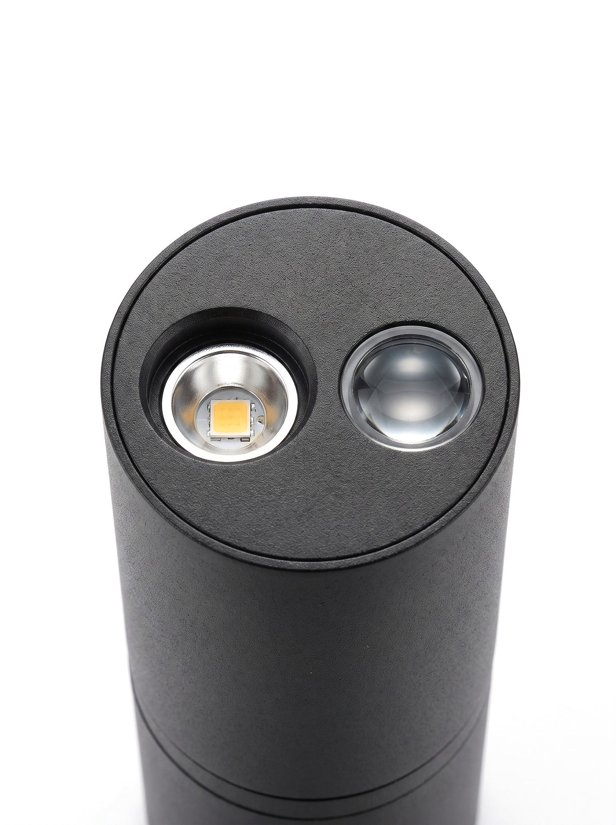 Macro close-up of the warm-white LED emitter and lens