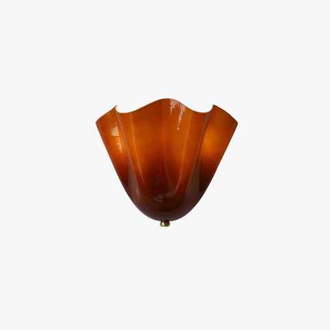 Zerane art glass wall sconce with amber curved shade and gold frame, hero view on white
