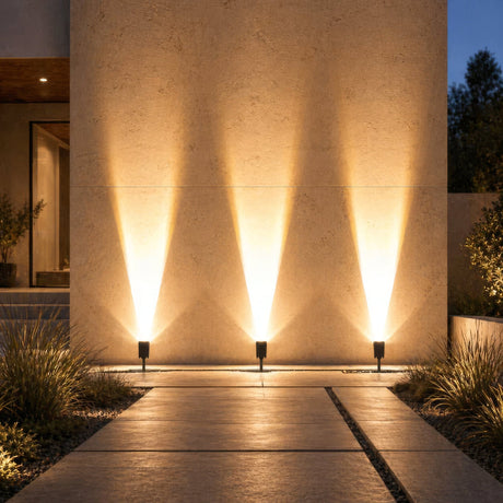Vale solar spotlights uplighting a wall in warm white