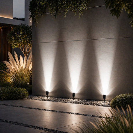Vale solar spotlights uplighting a wall in cool white
